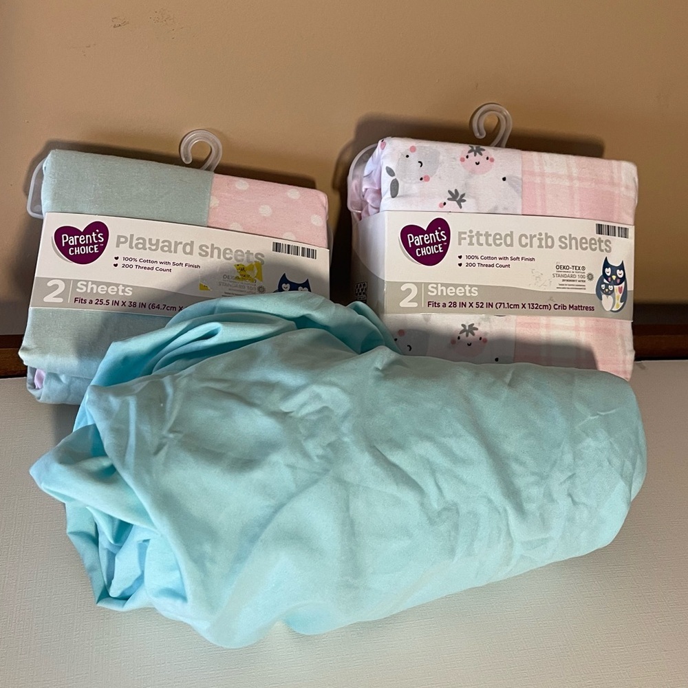 Crib and play yard sheets set of 5 plus one loose one new unused